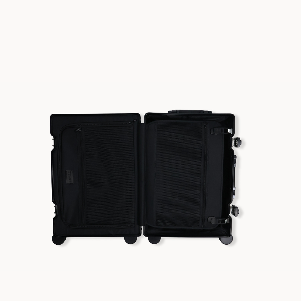 CHAVELLE aluminium suitcase open view showing spacious interior and compartments