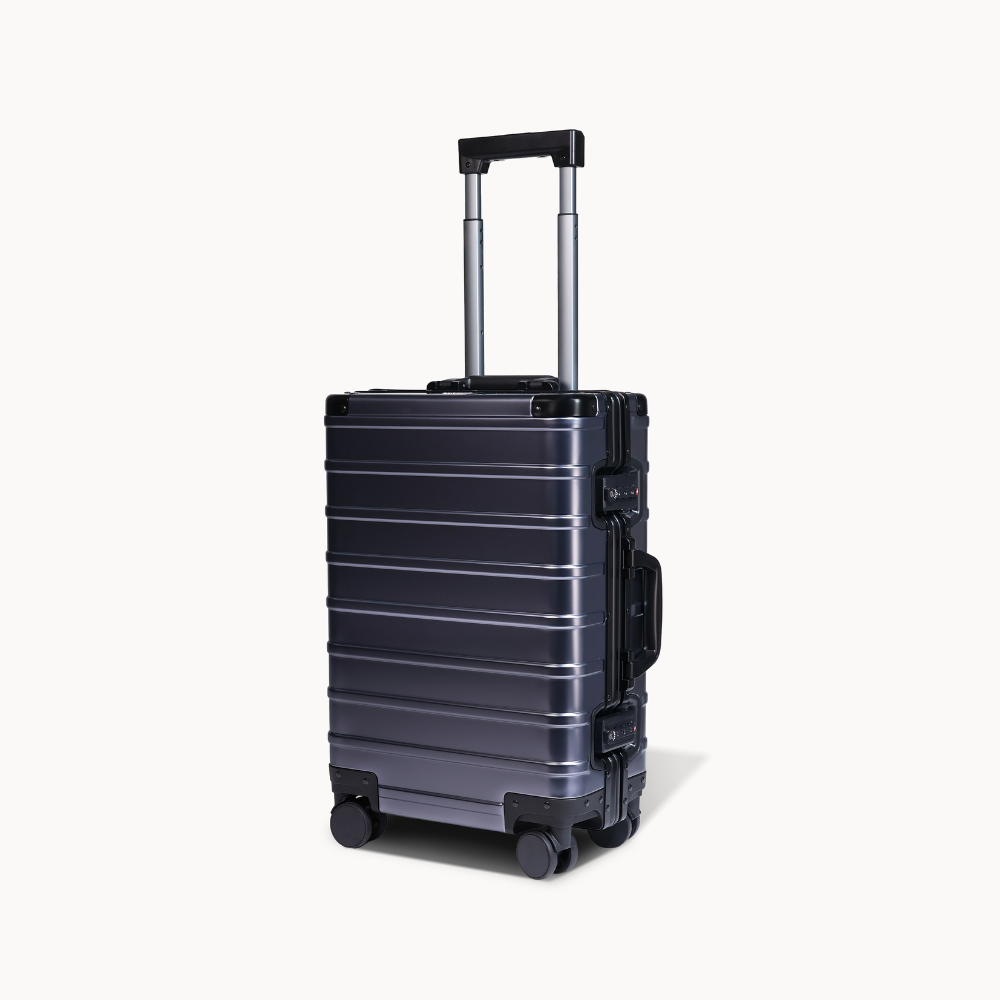 CHAVELLE aluminium suitcase gun metal angled view showing reinforced corners and sleek finish