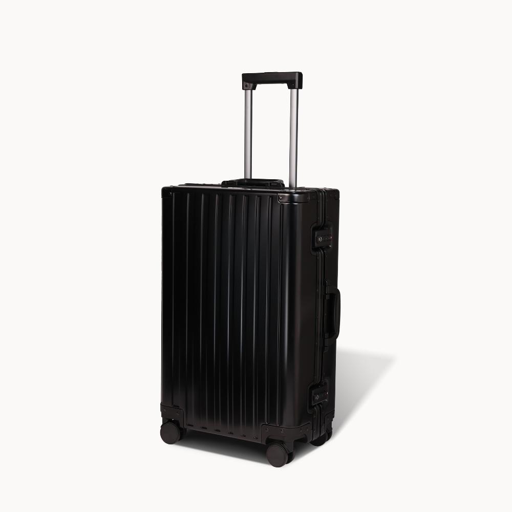 CHAVELLE aluminium suitcase black angled view showing reinforced corners and sleek finish