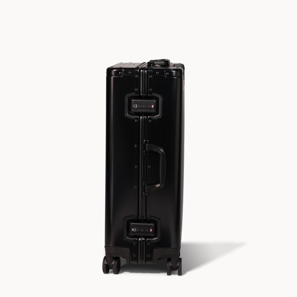 CHAVELLE aluminium suitcase black close-up of TSA-approved lock and side handle