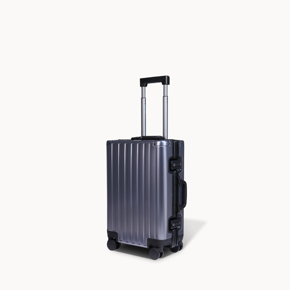 CHAVELLE aluminium suitcase gun metal angled view showing reinforced corners and sleek finish