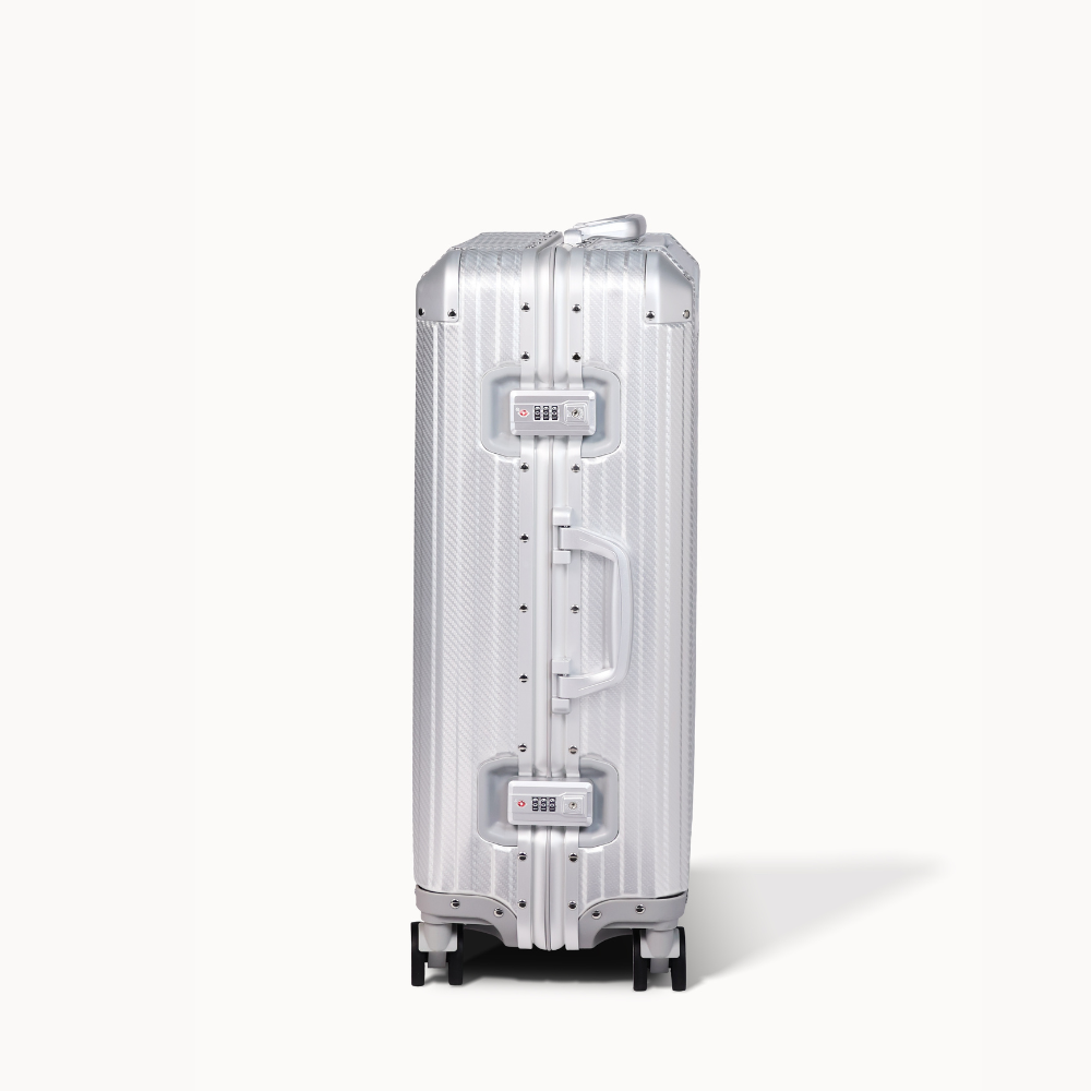 Silver suitcase on a white background