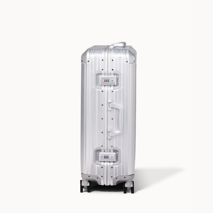 Silver suitcase on a white background