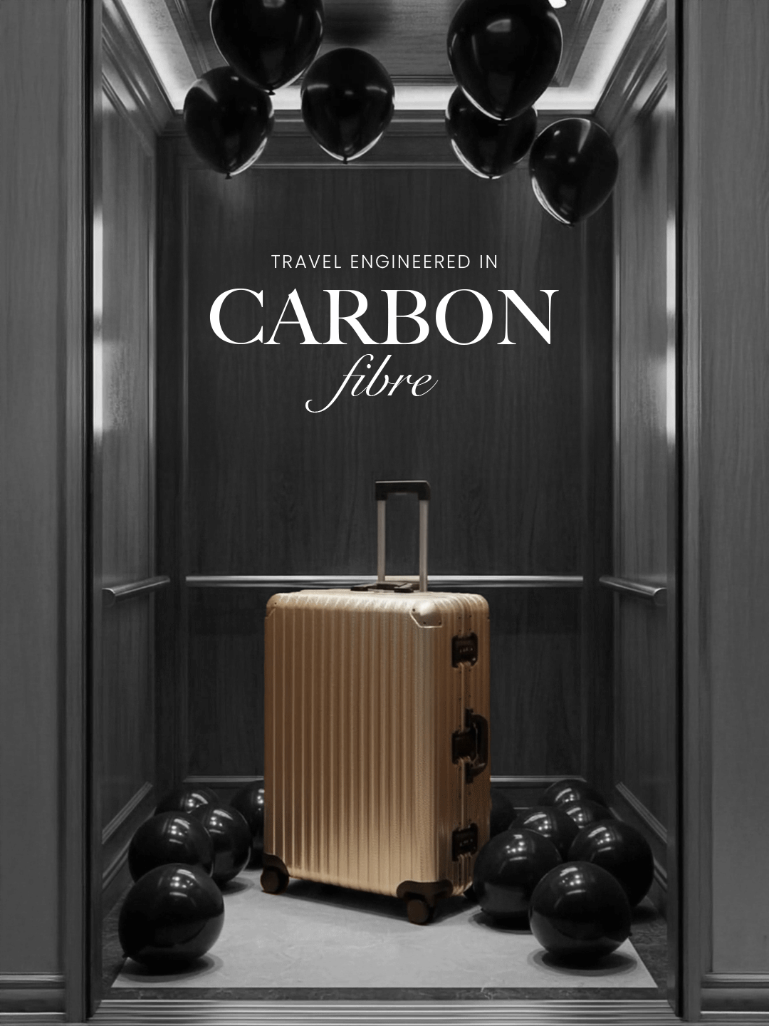 Gold suitcase in a display case with 'Carbon fibre' text and black spheres.