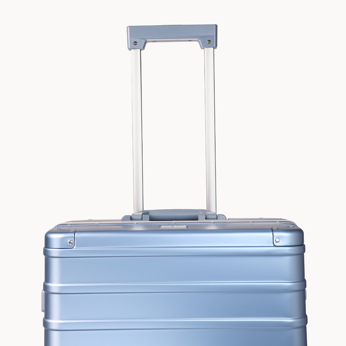 CHAVELLE luxury aluminium suitcase ice blue with reinforced corners and long open telescopic handle
