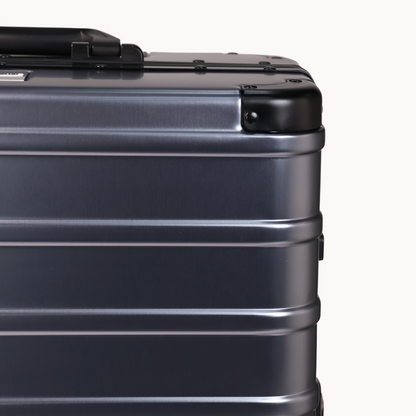 CHAVELLE luxury aluminium suitcase gun metal close-up of reinforced corners