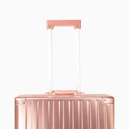 CHAVELLE luxury aluminium suitcase rose gold with reinforced corners and long open telescopic handle