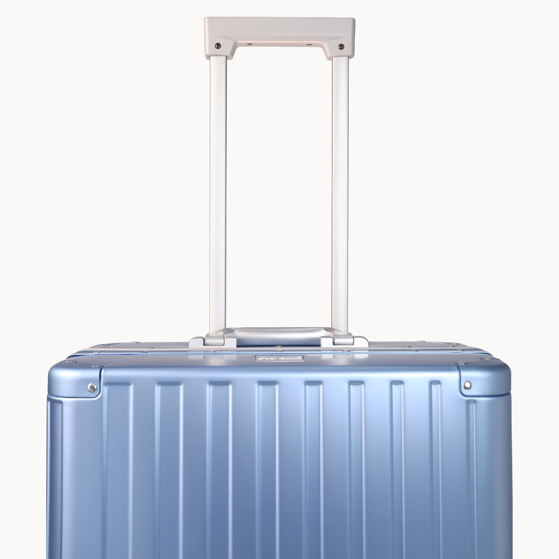 CHAVELLE luxury aluminium suitcase blue with reinforced corners and long open telescopic handle
