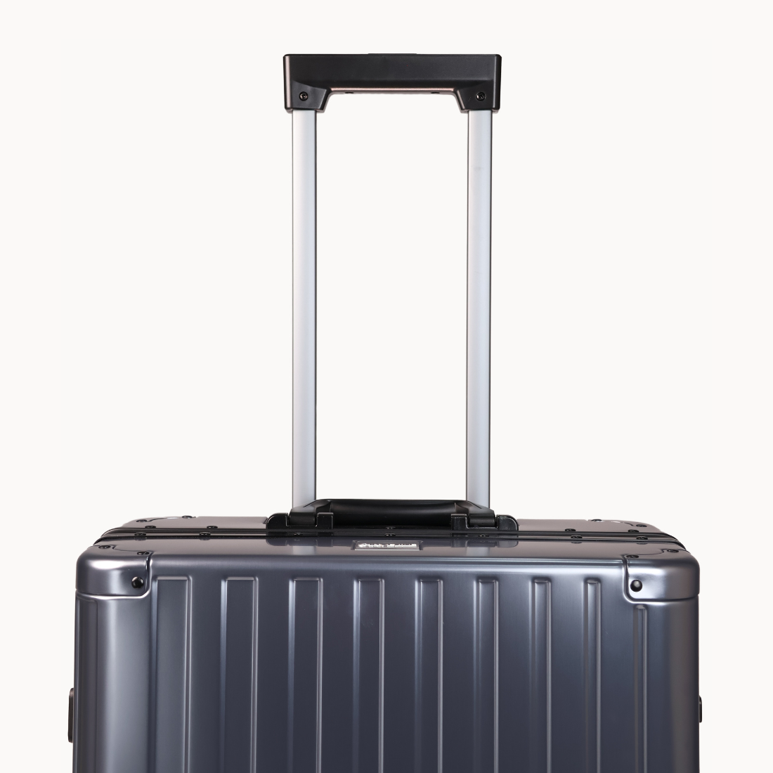 CHAVELLE luxury aluminium suitcase gun metal with reinforced corners and long open telescopic handle