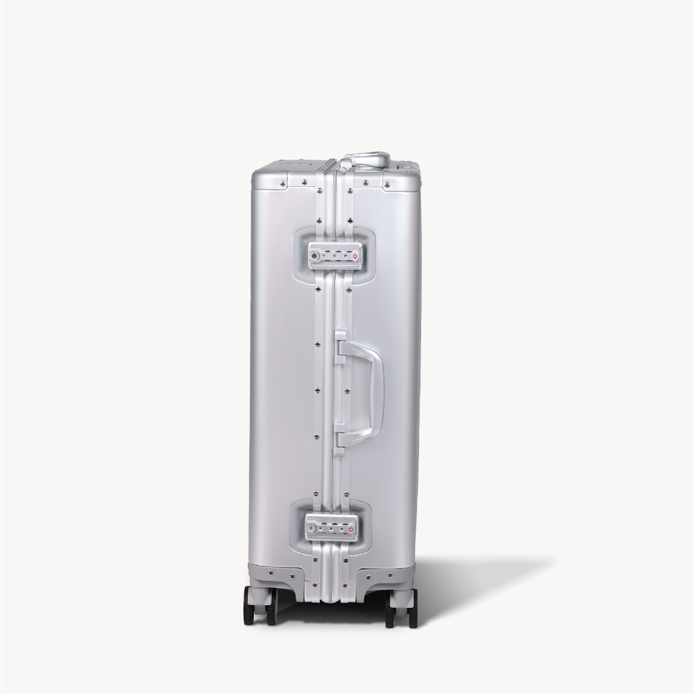 CHAVELLE aluminium suitcase silver close-up of TSA-approved lock and side handle