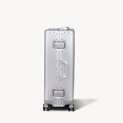 CHAVELLE aluminium suitcase silver close-up of TSA-approved lock and side handle