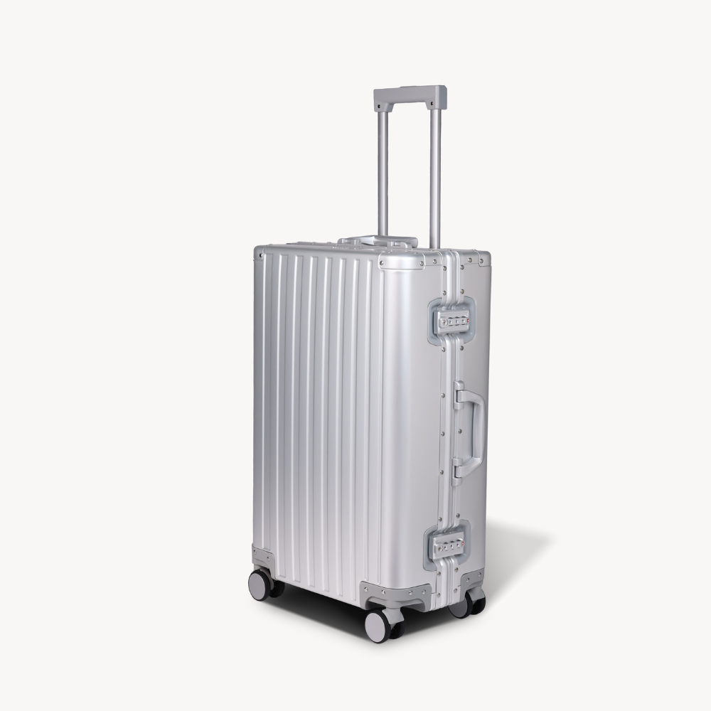 CHAVELLE aluminium suitcase silver angled view showing reinforced corners and sleek finish