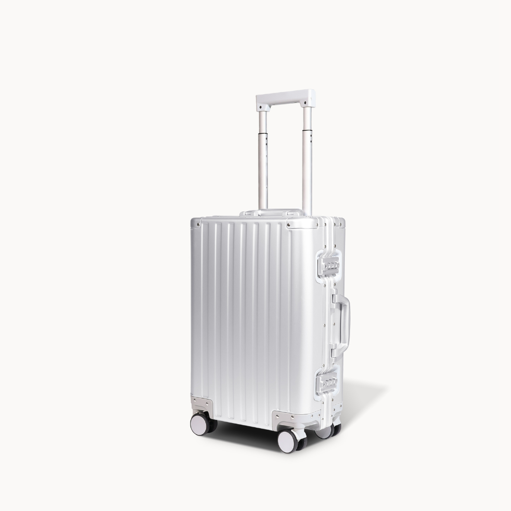 CHAVELLE aluminium suitcase silver angled view showing reinforced corners and sleek finish

