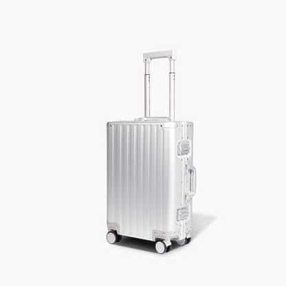 CHAVELLE aluminium suitcase silver angled view showing reinforced corners and sleek finish

