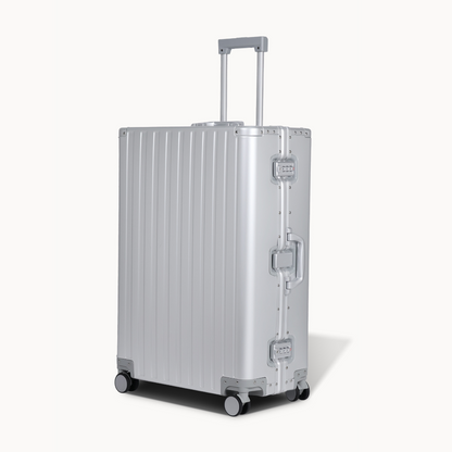 CHAVELLE aluminium suitcase silver angled view showing reinforced corners and sleek finish
