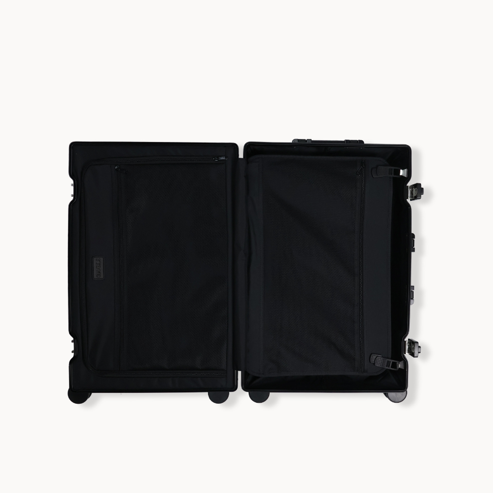 CHAVELLE aluminium suitcase black open view showing spacious interior and compartments