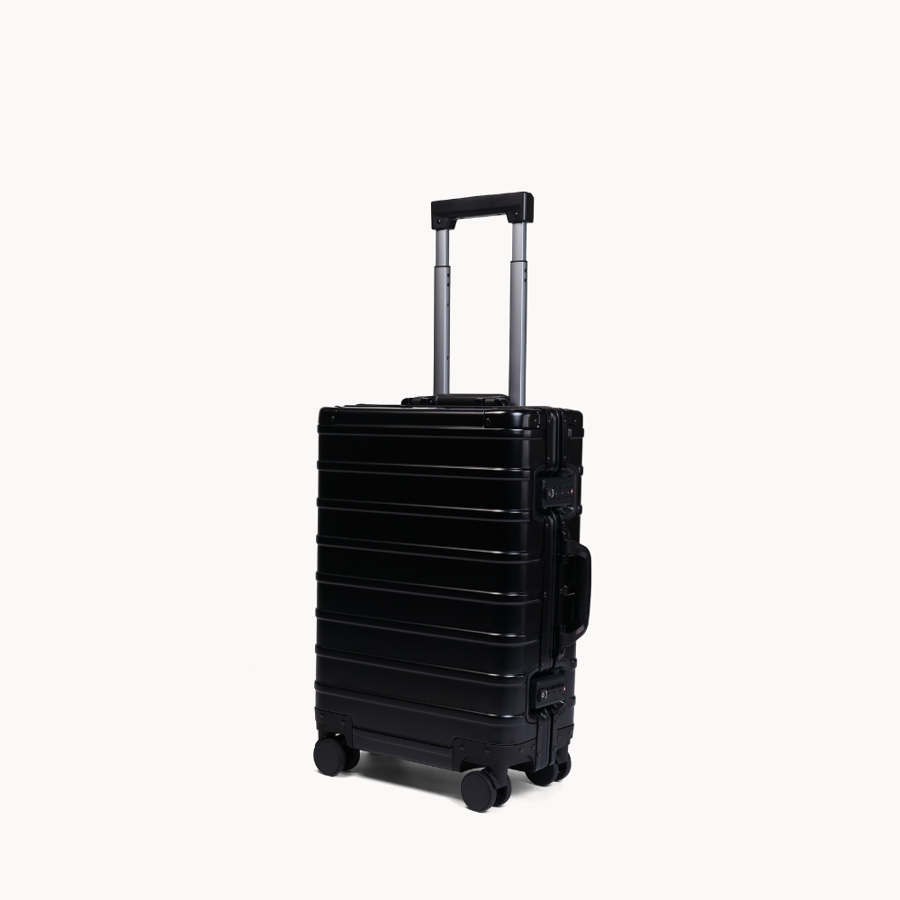 CHAVELLE aluminium suitcase black angled view showing reinforced corners and sleek finish 