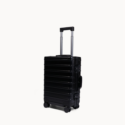 CHAVELLE aluminium suitcase black angled view showing reinforced corners and sleek finish 