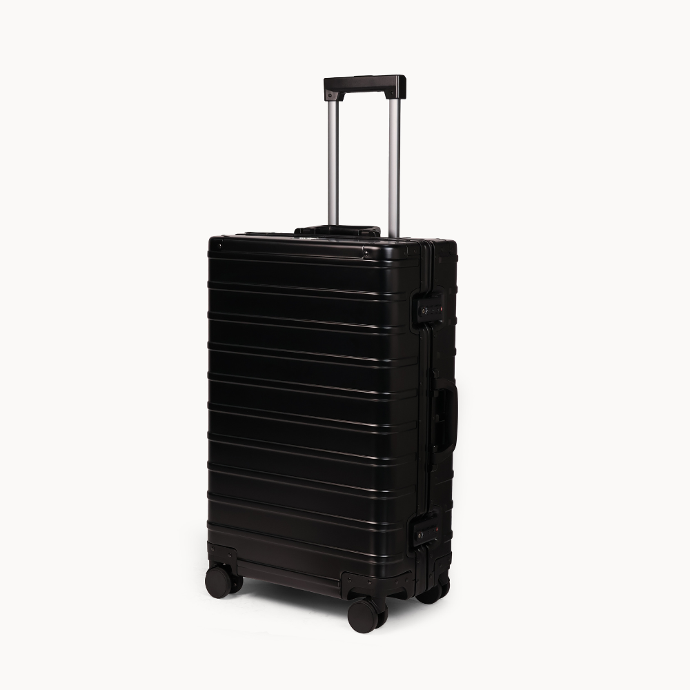 CHAVELLE aluminium suitcase black angled view showing reinforced corners and sleek finish 