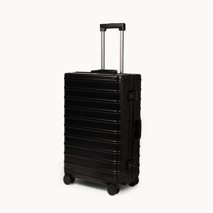 CHAVELLE aluminium suitcase black angled view showing reinforced corners and sleek finish 