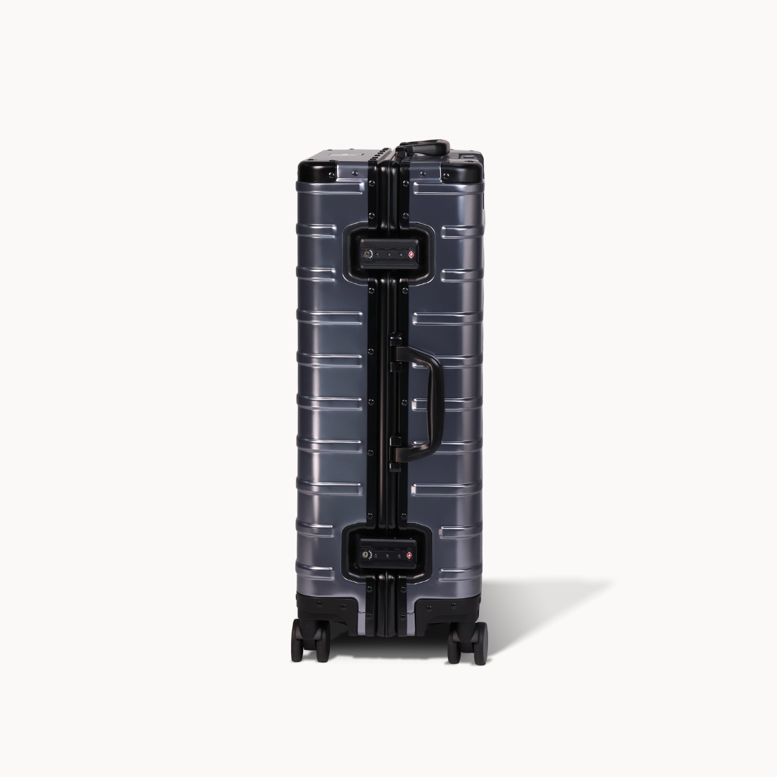 CHAVELLE aluminium suitcase gun metal close-up of TSA-approved lock and side handle