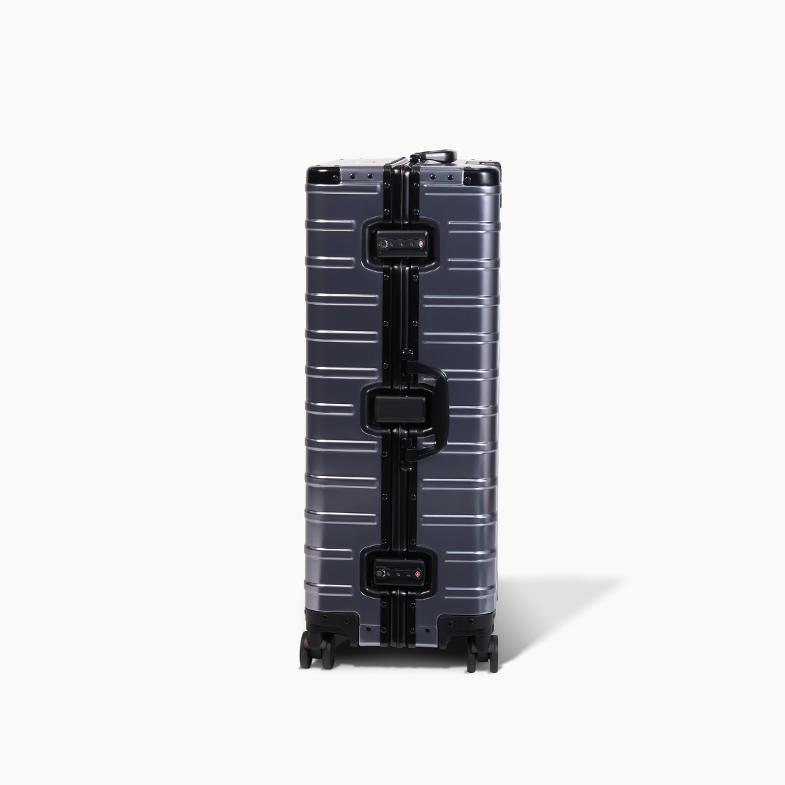 CHAVELLE aluminium suitcase gun metal close-up of TSA-approved lock and side handle