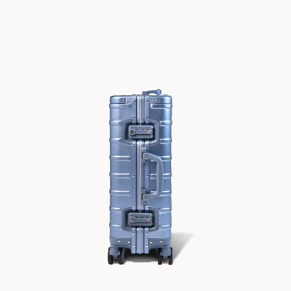 CHAVELLE aluminium suitcase ice blue close-up of TSA-approved lock and side handle