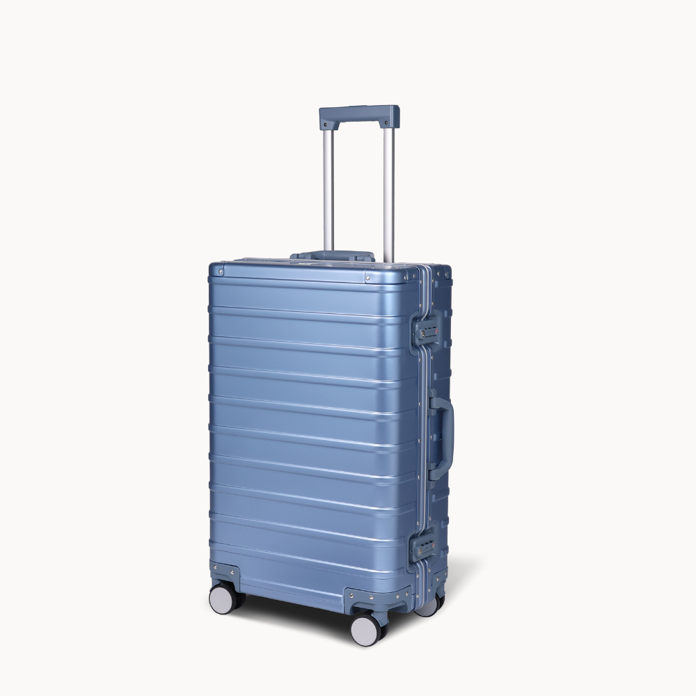 CHAVELLE aluminium suitcase ice blue angled view showing reinforced corners and sleek finish 