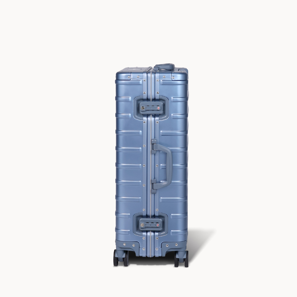 CHAVELLE aluminium suitcase ice blue close-up of TSA-approved lock and side handle