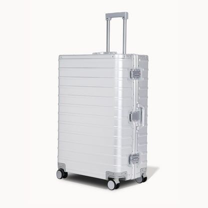 CHAVELLE aluminium suitcase silver angled view showing reinforced corners and sleek finish
