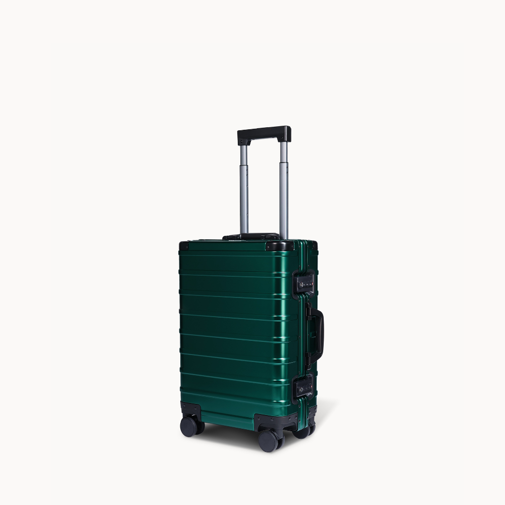 CHAVELLE aluminium suitcase stone green angled view showing reinforced corners and sleek finish 
