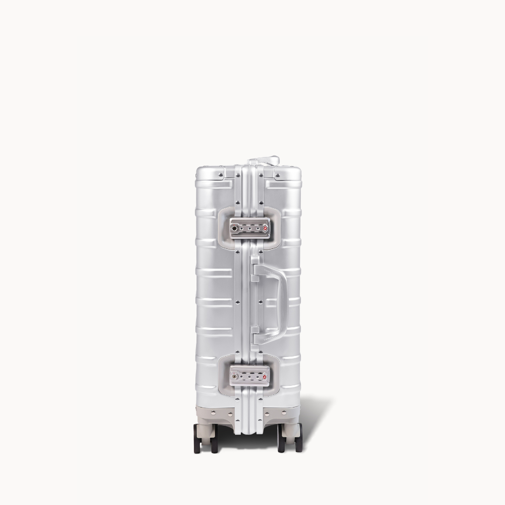 CHAVELLE aluminium suitcase silver close-up of TSA-approved lock and side handle