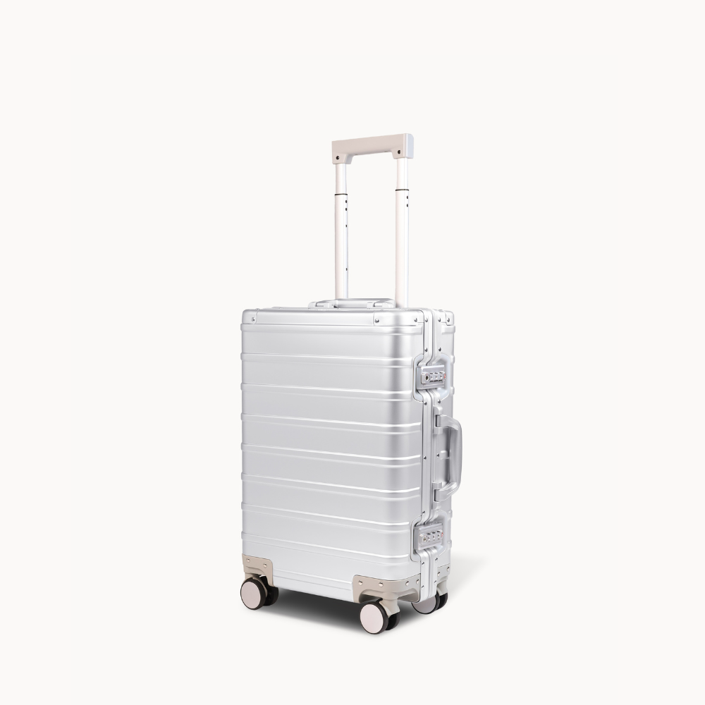 CHAVELLE aluminium suitcase silver angled view showing reinforced corners and sleek finish
