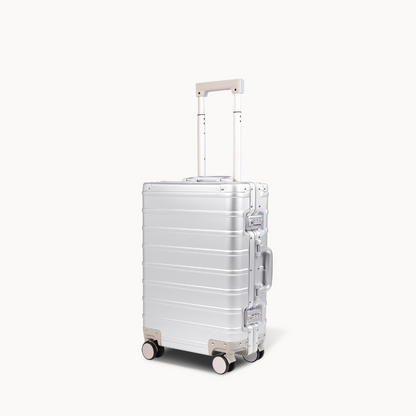 CHAVELLE aluminium suitcase silver angled view showing reinforced corners and sleek finish
