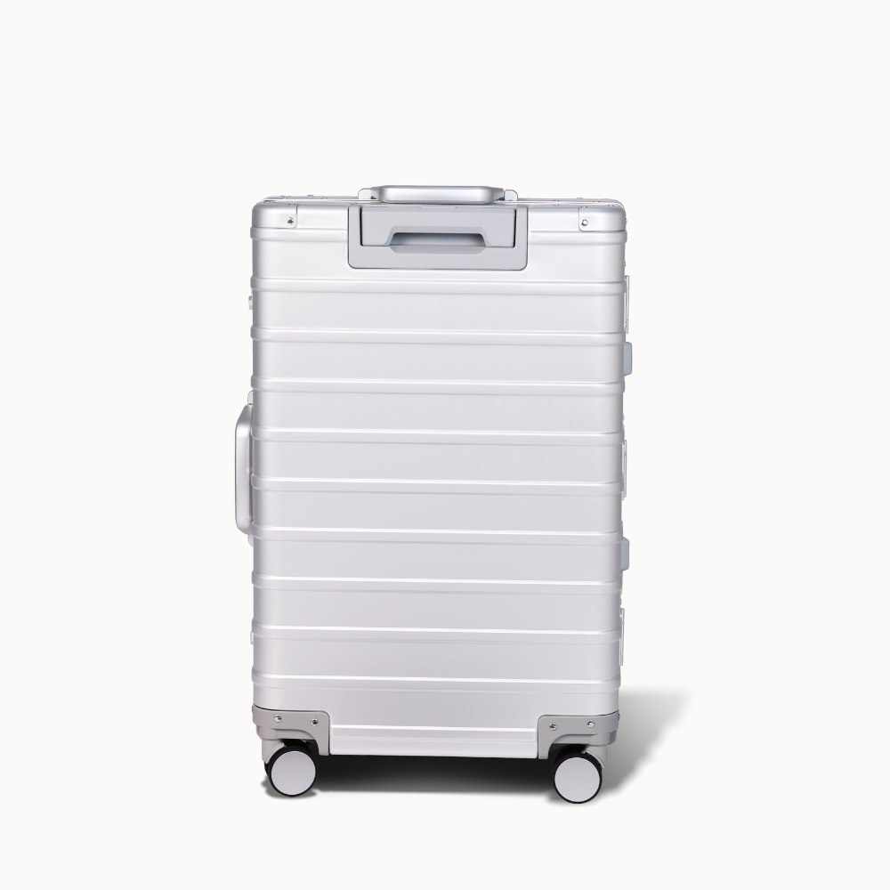 CHAVELLE aluminium suitcase silver angled view showing reinforced corners and sleek finish

