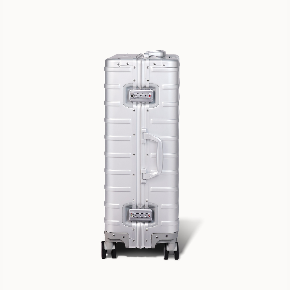 CHAVELLE aluminium suitcase silver close-up of TSA-approved lock and side handle
