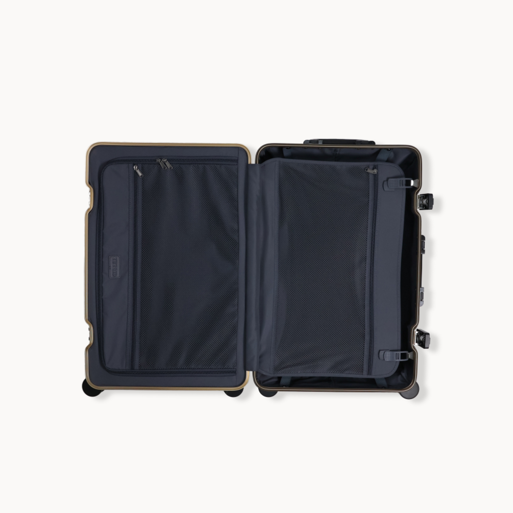 Open suitcase with interior compartments on a white background