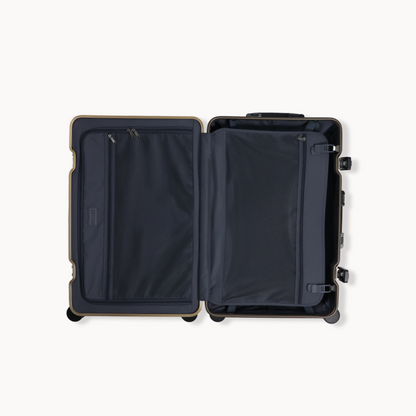Open suitcase with interior compartments on a white background