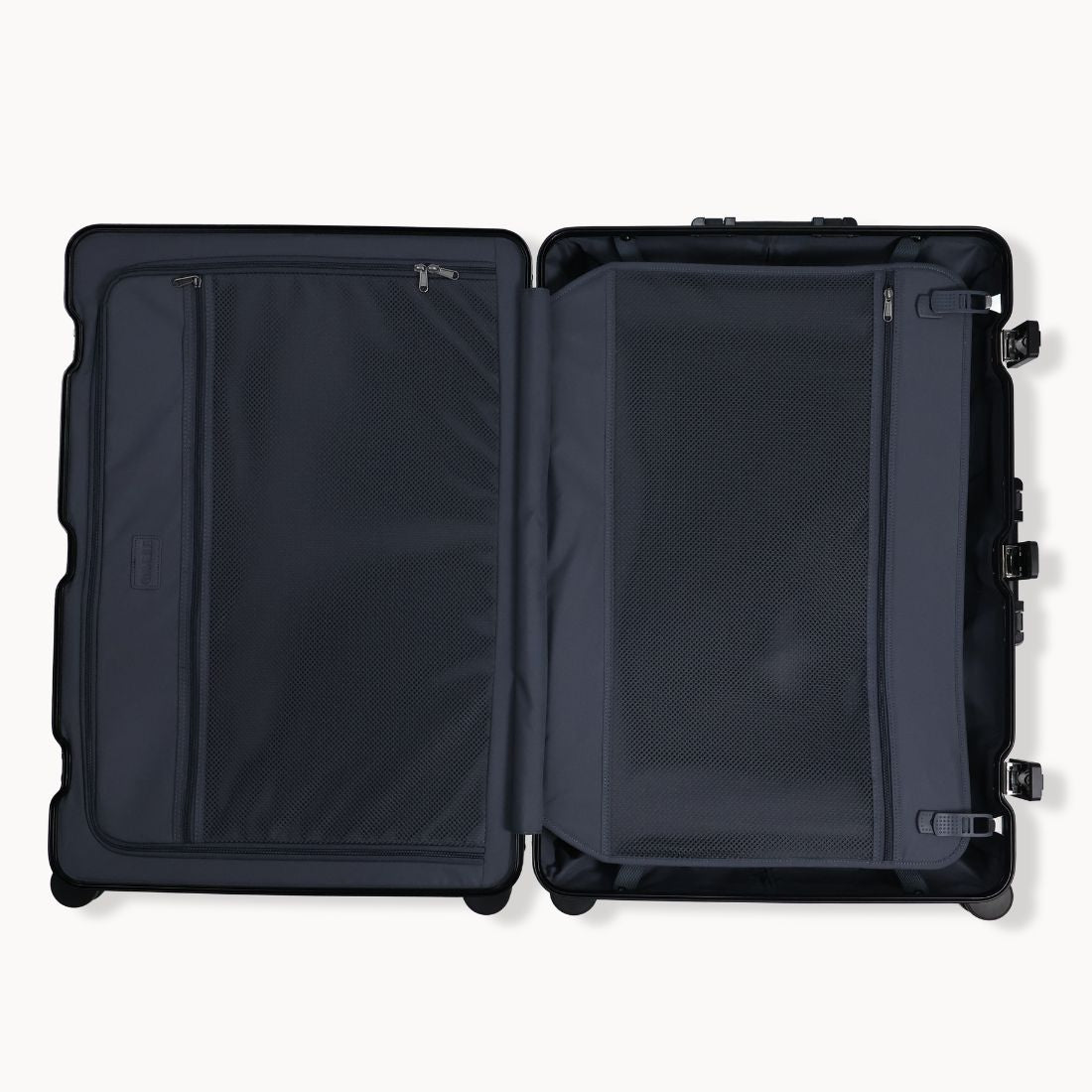 Black suitcase with open lid on a white background