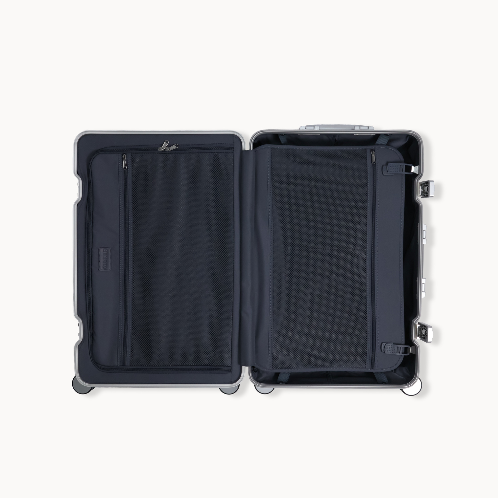 Open black suitcase on a white background