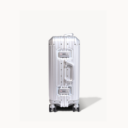 Silver suitcase on a white background