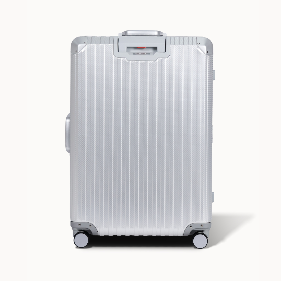 Silver suitcase with a visible brand logo on a white background