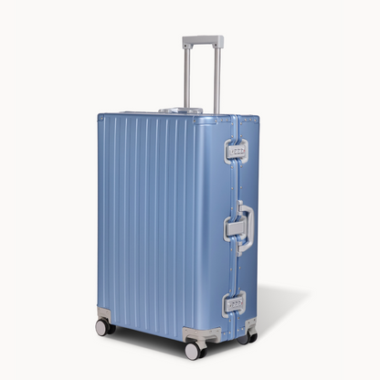 CHAVELLE aluminium suitcase blue angled view showing reinforced corners and sleek finish 