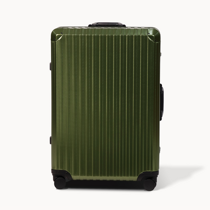 Green suitcase with a textured surface on a white background