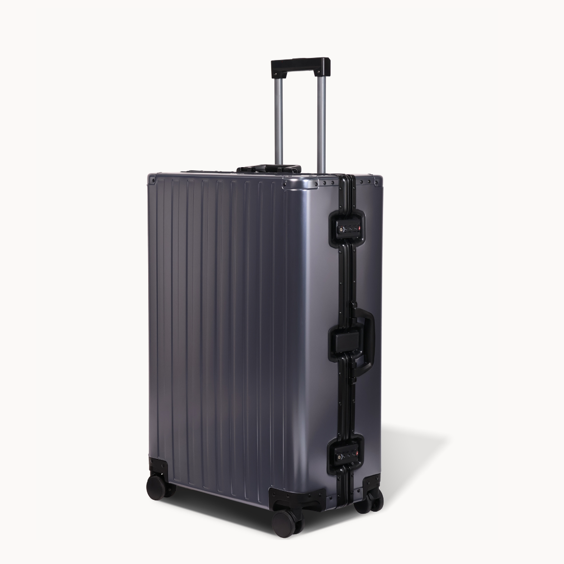 CHAVELLE aluminium suitcase gun metal angled view showing reinforced corners and sleek finish