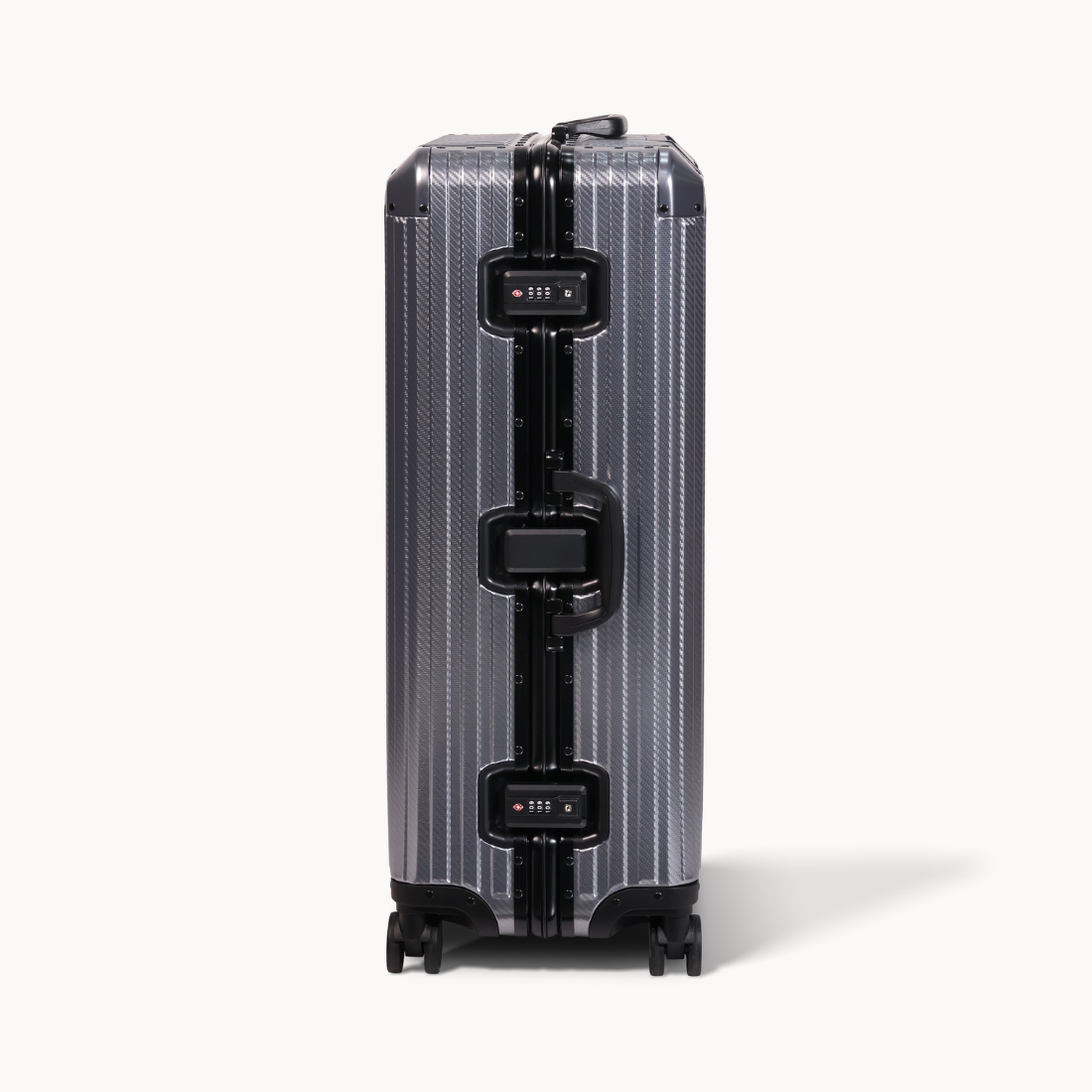 Silver suitcase with black accents on a white background