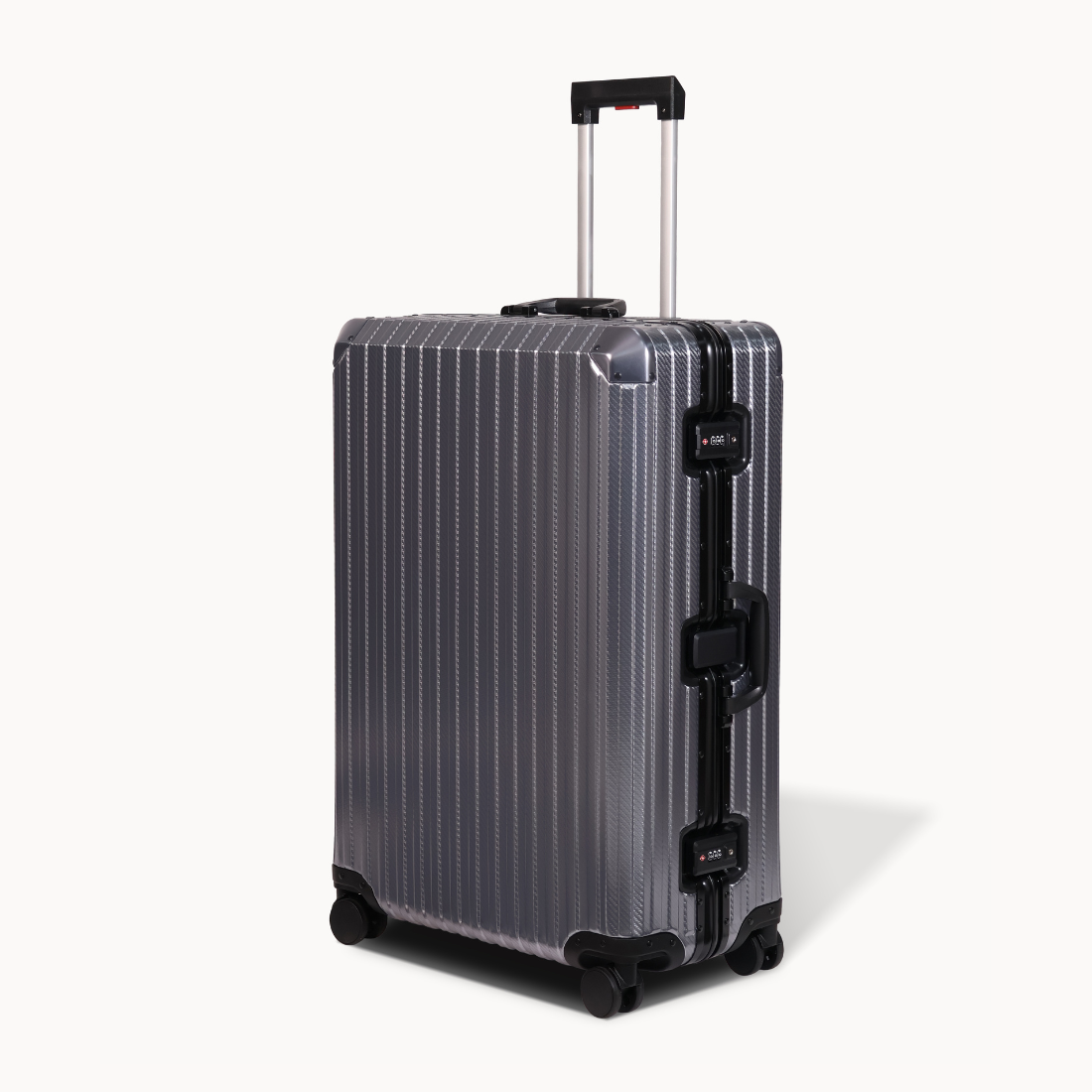 Silver suitcase with black accents on a white background