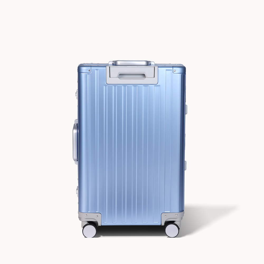 CHAVELLE luxury aluminium suitcase blue back profile with glossy finish 
