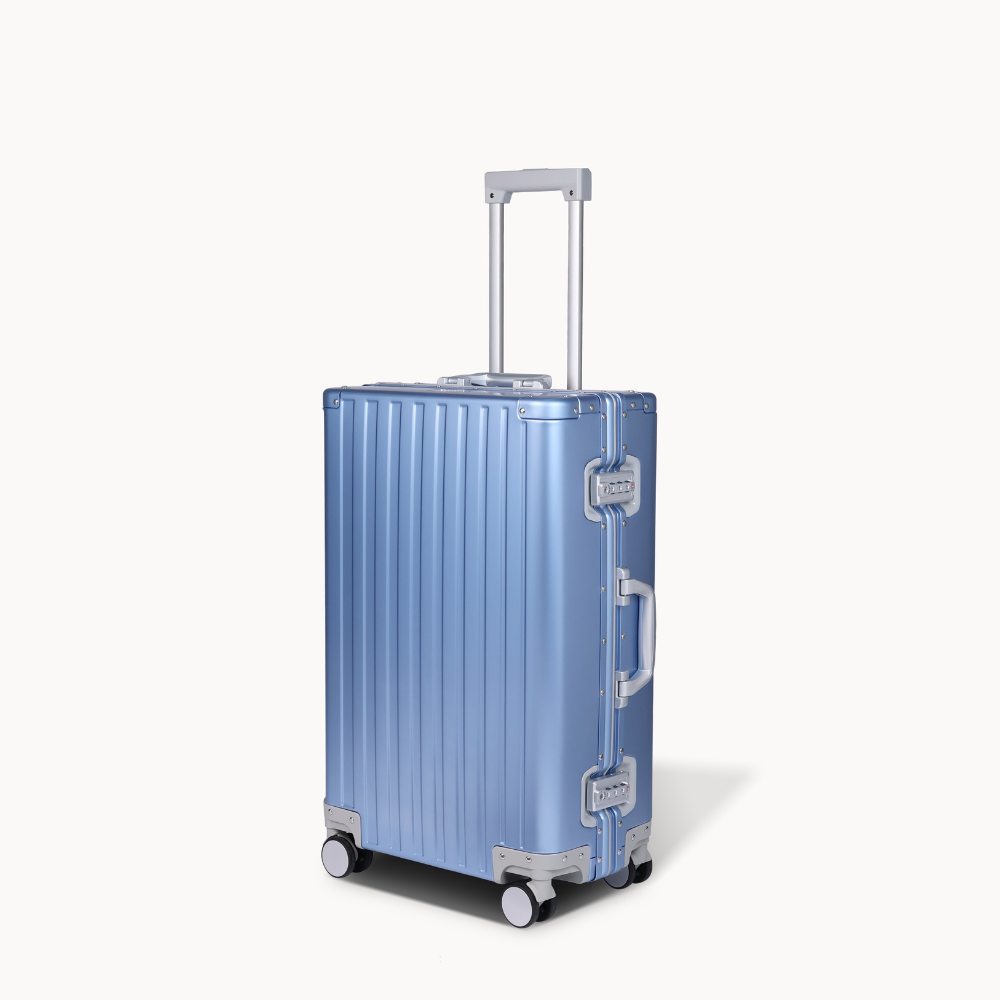 CHAVELLE aluminium suitcase blue angled view showing reinforced corners and sleek finish 