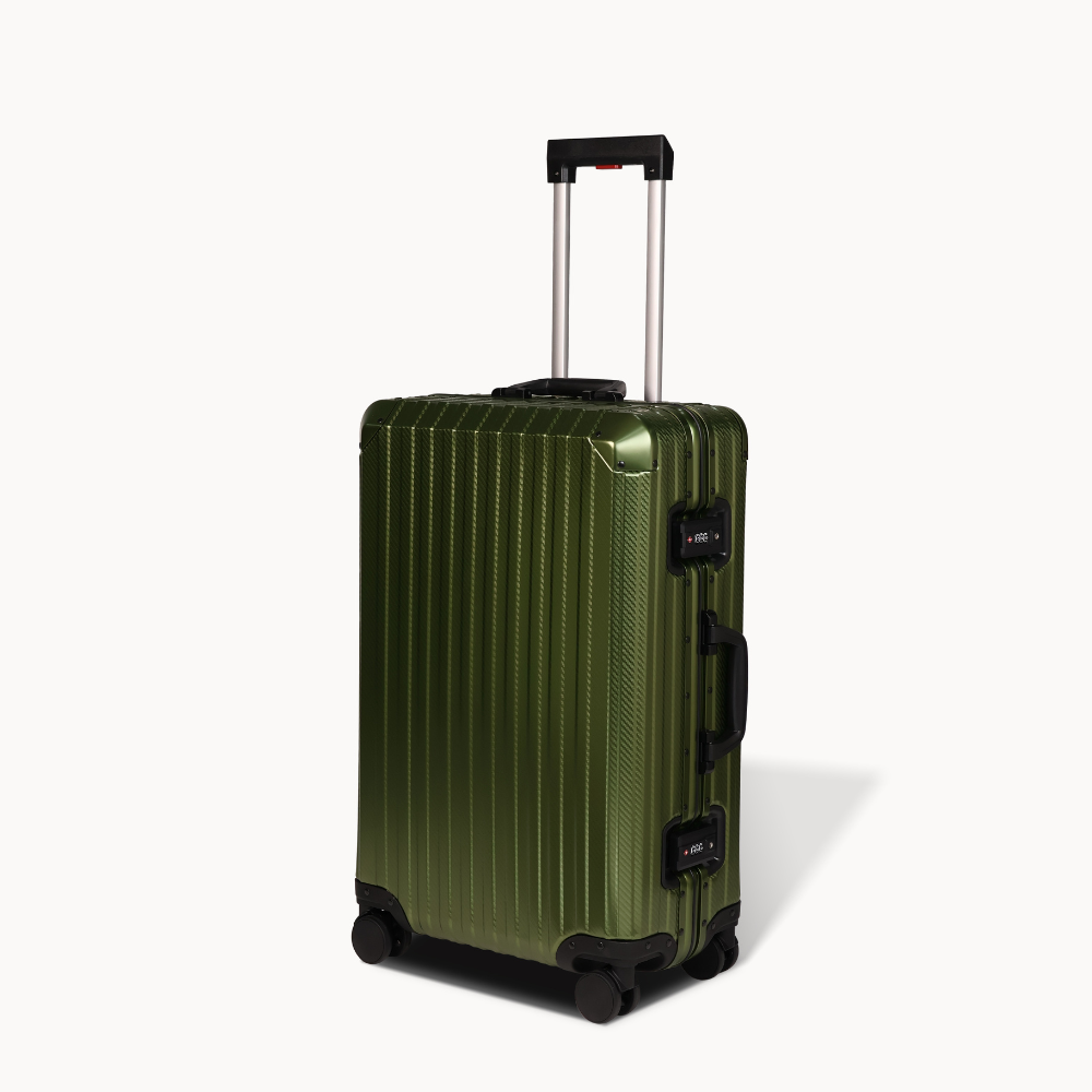 Green suitcase with a black handle and wheels on a white background